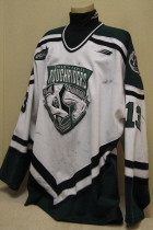 Cedar Rapids RoughRiders Mike Pasley 2001-02/02-03  This one was worn by forward Mike Pasley. Judging by the wear, this one must have been worn both seasons Mike was with the Riders, 2001-02 and 2002-03. Great wear, lots of team repairs. It is manufactured by Bauer and is a size 56.