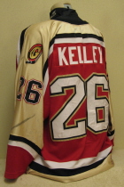 Chris Kelley 03-04 Green Bay Gamblers red #26. This one was worn during the 2003-04 USHL Anaversary season. Tie-down front, "G" alternate logos on the shoulder, USHL and Gemini patches on right chest. League 25 Year Anniversary patch on rear hem. Made by Gemini and is a size 56.