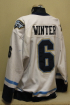 Travis Winter #6 Indiana Ice 2004-05 White #6.  This one was worn by defenseman Travis Winter during the inaugural season of the Indiana Ice USHL hockey team. This size 58 by SP has great wear. Also has alternate captain "A" with SP logo on left chest and Ice patches on both shoulders.