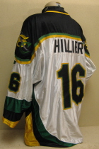 Justin Hillier #16 White 1999-2000.  Worn one season by Justin Hillier. This homer is made by K1. Shoulder patches, NOB, USHL crest and nice wear on 'Dazzle" material. 