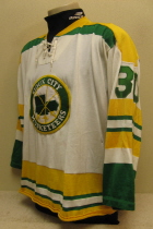 Pete Maxwell & Terry Mulroy #30 1972-74 This jersey is from the Musketeers very first season, 1972-73, as members of the USHL. It was worn two seasons, first by goaltender Pete Maxwell and then Terry Mulroy.