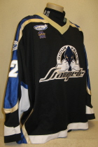 Jim Henkenmeyer Sioux Falls Stamepde 2002-03  #3 Worn during the 2002-03 USHL season. Shows great wear. Made by Gemini and is a size 54. NOB, shoulder patches, USHL & Gemini Crest on front. This style of jersey was worn for the first four seasons. 1999-2000 was Sioux Falls' first season in the league. 