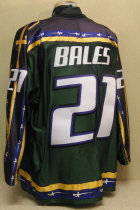 Brian Bales 2003-04 Third jersey.  This one was worn during the 2003-04 season by Brian Bales. This was the first season in the new Tyson Event Center, a 6500 seat NHL style arena. This season marked the introduction of purple to the traditional Green Yellow Black Musketeer colors as well as a new logo. Made by Gemini and is a size 52