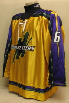 Andrew Rowe  #6 Yellow 06-07.  This  jersey was worn during the 2006-07 season by Andrew Rowe. Manufactured by OT Sports, this size 54 shows nice wear. This was the first season for the yellow jerseys.  The Musketeers also wore a special purple jersey for part of the season and a dark green for the road jerseys.