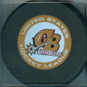 2004-05 Official game Puck Green Bay Gamblers. These were was available at the start of the 04-05 season and were sold through some of the team stores or directly from the League supplier, OGP Enterprises. Shown are both versions. Each puck also has the official USHL logo on the reverse.
