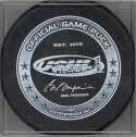2006-07  Official Game Puck reverse logo. Marked Official Game Puck. This USHL logo has been the official logo on game pucks since the start of the 2004 season. Several teams have also used official game pucks with a sponcer on the reverse as well.